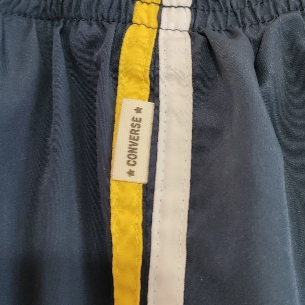 Converse suit shown pockets
